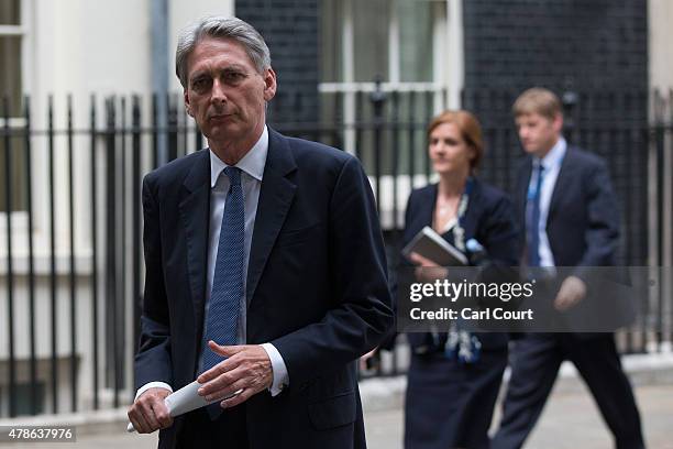 Defence Secretary Philip Hammond leaves Downing Street after attending an emergency security meeting following the deadly attacks on tourists in...