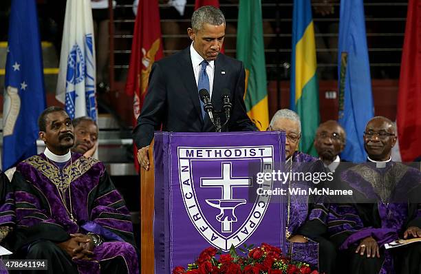 President Barack Obama delivers the eulogy for South Carolina state senator and Rev. Clementa Pinckney during Pinckney's funeral service June 26,...