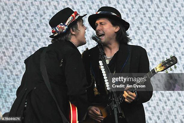 Pete Doherty and Carl Barat of The Libertines perform live on the Pyramid stage during the first day of the Glastonbury Festival at Worthy Farm,...