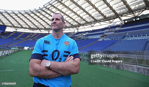 Stuart Lancaster, the England head coach looks around the stadium during the England captain's run at the Stadio Olimpico on March 14, 2014 in Rome,...