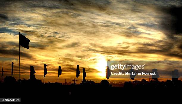 Sunset at the Glastonbury Festival at Worthy Farm, Pilton on June 26, 2015 in Glastonbury, England.