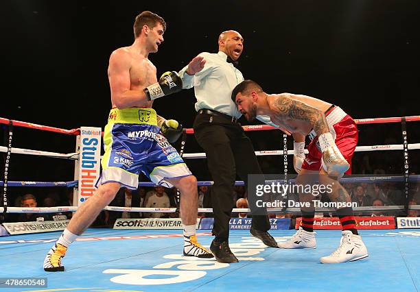 Referee Ian John Lewis steps in to stop the fight betweenRocky Fielding and Bryan Vera during their WBC International Super Middleweight Championship...