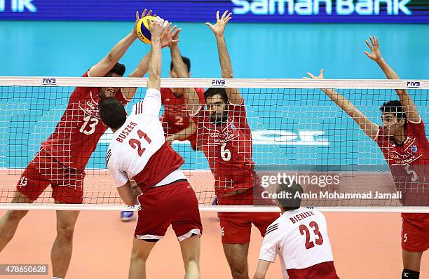 Mahdavi Mehdi and Mousavi Eraghi Seyed Mohammad and Ghaemi Farhad and Buszek Rafal of plonad in action during FIVB Volleyball World League 2015 Iran...