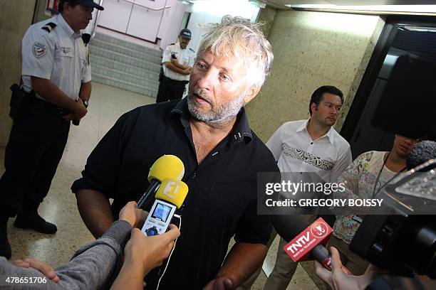 Swiss yachtsman Yvan Bourgnon addresses reporters upon his arrival at Tahiti airport on June 26 three days after his brother Swiss yachtsman Laurent...