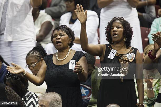 Mourners gather at the College of Charleston TD Arena during the memorial service for Reverend Clementa Pinckney in Charleston, USA on June 26, 2015....