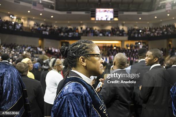 Mourners gather at the College of Charleston TD Arena during the memorial service for Reverend Clementa Pinckney in Charleston, USA on June 26, 2015....