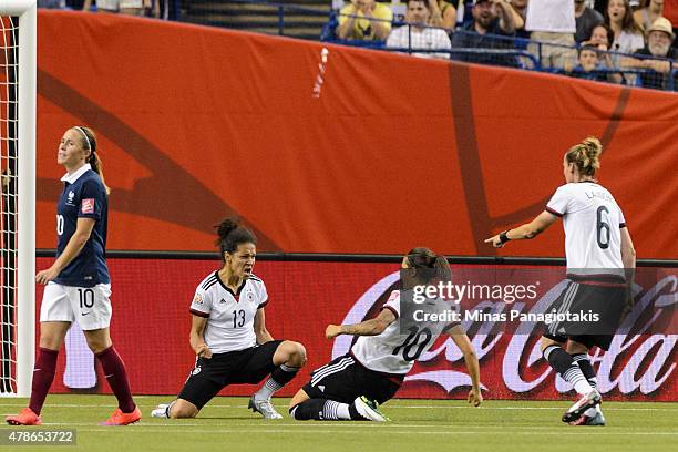 Celia Sasic of Germany celebrates her goal with teammates during the 2015 FIFA Women's World Cup quarter final match against France at Olympic...