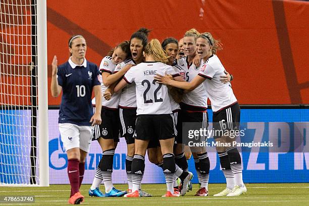 Celia Sasic of Germany celebrates her goal with teammates during the 2015 FIFA Women's World Cup quarter final match against France at Olympic...