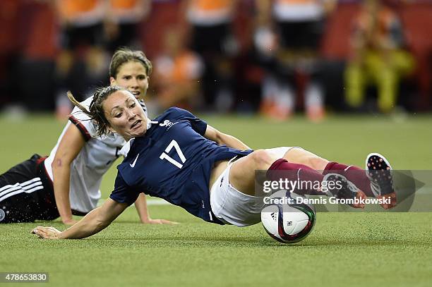 Gaetane Thiney of France vies for the ball during the FIFA Women's World Cup Canada 2015 Quarter Final match between Germany and France at Olympic...