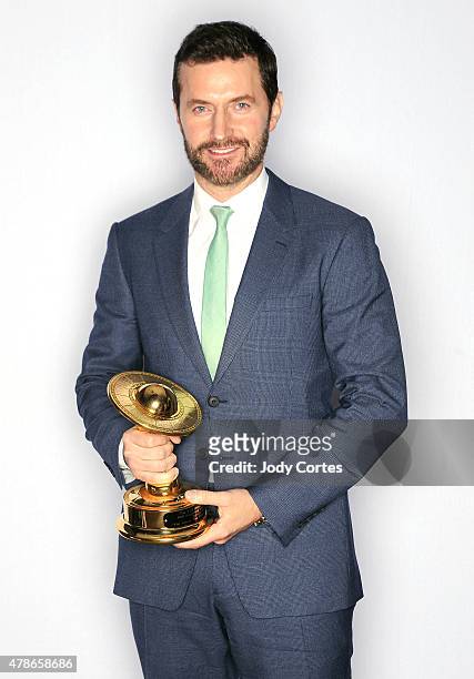 Actor Richard Armitage poses with his award for Best Supporting Actor in 'The Hobbit: The Battle of the Five Armies' at 41st Annual Saturn Awards...