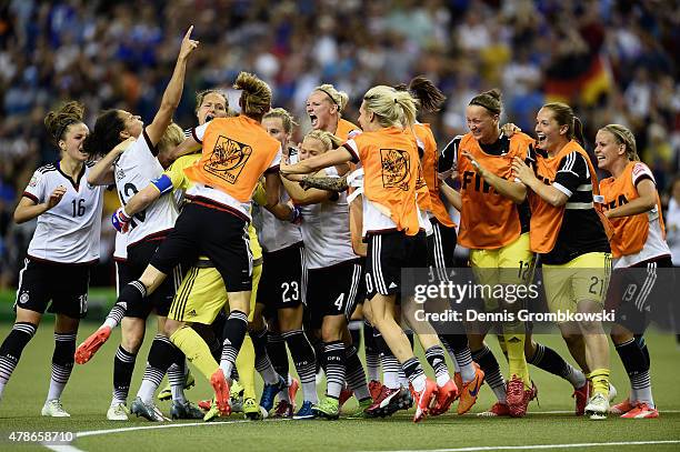 Nadine Angerer of Germany celebrates with team mates as she saves the final penalty during the FIFA Women's World Cup Canada 2015 Quarter Final match...