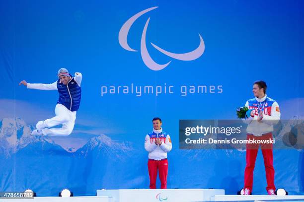 Silver medalist Vincent Gauthier-Manuel of France, gold medalist Alexey Bugaev of Russia and bronze medalist Alexander Alyabyev of Russia celebrate...