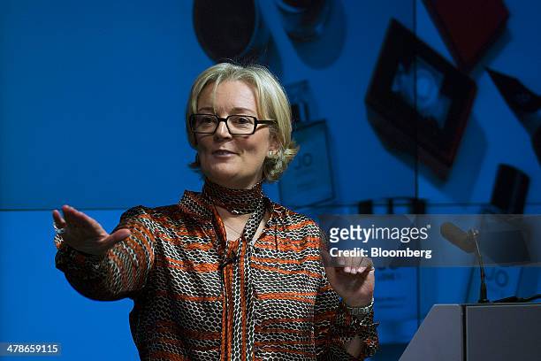 Jo Malone, founder of Jo Loves, the luxury retailer of fragrances, perfumes, and candles, gestures as she speaks during a "Women in Business" event...