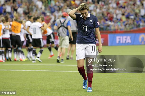 Claire Lavogez looks down after giving away the win to team Germany during the FIFA Women's World Cup Canada 2015 quarter final match between Germany...