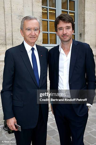 Owner of LVMH Luxury Group Bernard Arnault and his son General