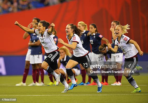 Celia Sasic, Sara Daebritz and Leonie Maier of Germany celebrate winning the quarter final match of the FIFA Women's World Cup between Germany and...