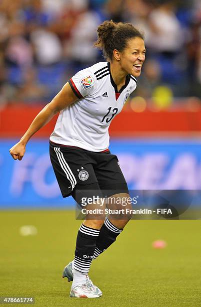Celia Sasic of Germany celebrate winning the quarter final match of the FIFA Women's World Cup between Germany and France at Olympic Stadium on June...