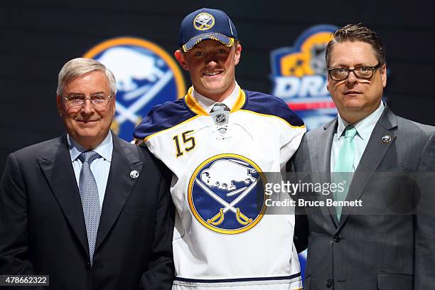 Jack Eichel poses on stage after being selected second overall by the Buffalo Sabres in the first round of the 2015 NHL Draft at BB&T Center on June...