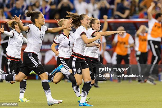 Members of Germany take to the pitch after defeating France on penalty kicks during the 2015 FIFA Women's World Cup quarter final match at Olympic...