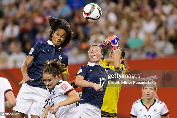 Nadine Angerer of Germany and Gaetane Thiney of France jump for the ball during the 2015 FIFA Women's World Cup quarter final match at Olympic...