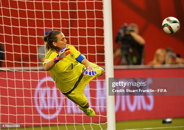 Nadine Angerer of Germany dives during the quarter final match of the FIFA Women's World Cup between Germany and France at Olympic Stadium on June...