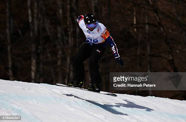 Keith Gabel of the United States competes during the Men's Para Snowboard Cross Standing on day seven of the Sochi 2014 Paralympic Winter Games at...