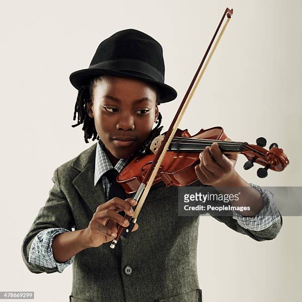 he'll be magnificent! - boy violin stockfoto's en -beelden