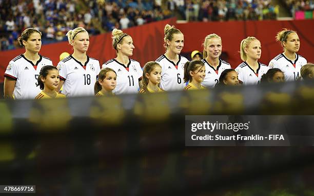 The team of Germany line up during the quarter final match of the FIFA Women's World Cup between Germany and France at Olympic Stadium on June 26,...