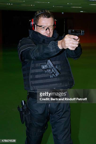 Actor Dany Boon performs with the RAID at 'La Maison du RAID' for the Filming of a sequence for 'Une nuit avec la Police et la Gendarmerie' : France...