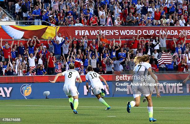 Carli Lloyd of the United States celebrates scoring the first goal against China in the FIFA Women's World Cup 2015 Quarter Final match at Lansdowne...