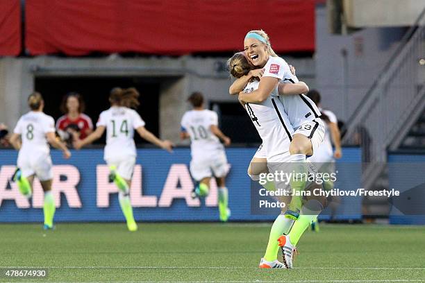 Becky Sauerbrunn and Julie Johnston of the United States celebrate after a goal by Carli Lloyd in the second half against China in the FIFA Women's...