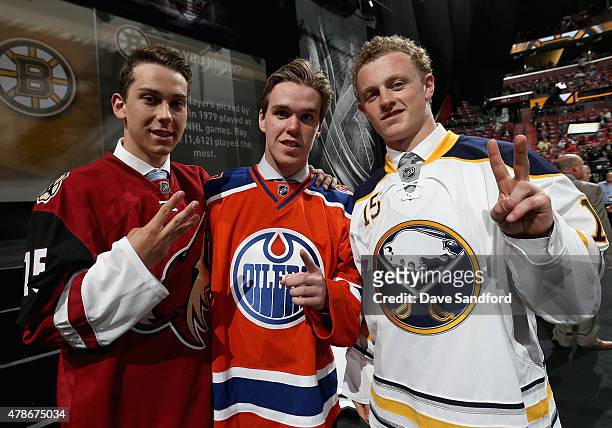 Third overall pick Dylan Strome of the the Arizona Coyotes, first overall pick Connor McDavid of the Edmonton Oilers and second overall pick Jacck...