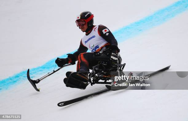 Kenji Natsume of Japan competes in the Men's Super Combined Sitting Super G on day seven of the Sochi 2014 Paralympic Winter Games at Rosa Khutor...