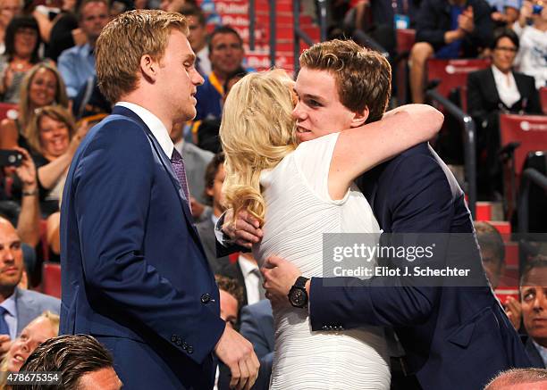 Connor McDavid hugs his mother Kelly after McDavid was selected first overall by the Edmonton Oilers during Round One of the 2015 NHL Draft at BB&T...