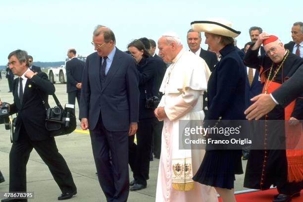Queen Paola of Belgium and King Albert of Belgium receive Pope John Paul II as he arrives at the airport for his official visit to Belgium on June 4,...