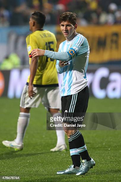 Lionel Messi of Argentina adjusts his captains armband during the 2015 Copa America Chile quarter final match between Argentina and Colombia at...