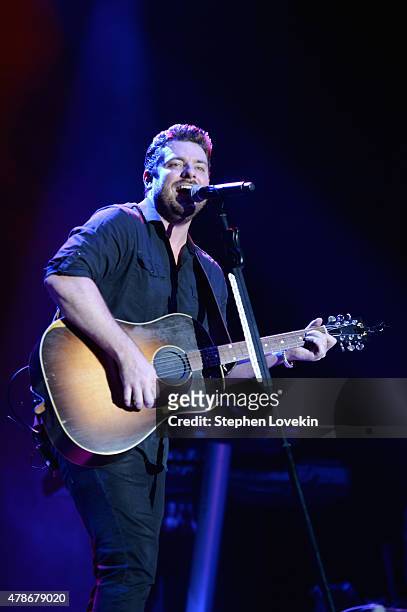 Musician Chris Young performs onstage during day 1 of the Big Barrel Country Music Festival on June 26, 2015 in Dover, Delaware.