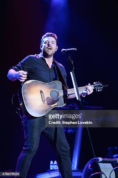 Musician Chris Young performs onstage during day 1 of the Big Barrel Country Music Festival on June 26, 2015 in Dover, Delaware.