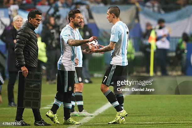 Ezequiel Lavezzi of Argentina substitutes Angel di Maria of Argentina during the 2015 Copa America Chile quarter final match between Argentina and...