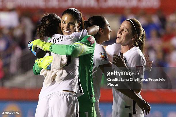 Hope Solo of the United States celebrates with Carli Lloyd after defeating China 1-0 in the FIFA Women's World Cup 2015 Quarter Final match at...