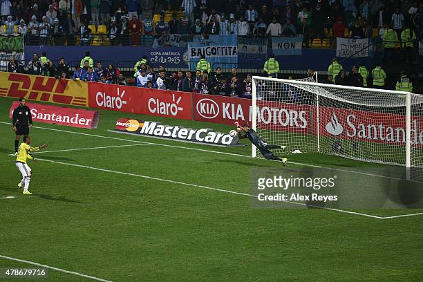 Goalkeeper of Argentina Sergio Romero stops the sixth penalty kick by Camilo Zuñiga of Colombia in the penalty shootout during the 2015 Copa America...