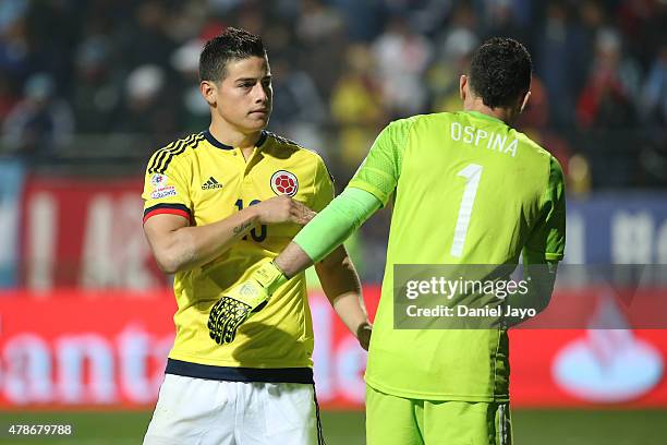 James Rodriguez of Colombia talks with David Ospina of Colombia in the penalty shootout during the 2015 Copa America Chile quarter final match...