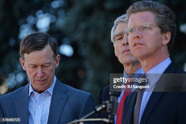 From left, Colorado Governor John Hickenlooper and U.S. Senator Mark Udall, and Shaun Donovan, Secretary of U.S. Housing and Urban Development,...
