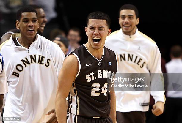 Matthew Wright of the St. Bonaventure Bonnies celebrates after a game winning basket by Jordan Gathers against the Saint Louis Billikens during the...