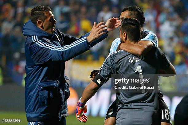 Carlos Tevez, Sergio Romero and Martin Demichelis of Argentina celebrate after the 2015 Copa America Chile quarter final match between Argentina and...