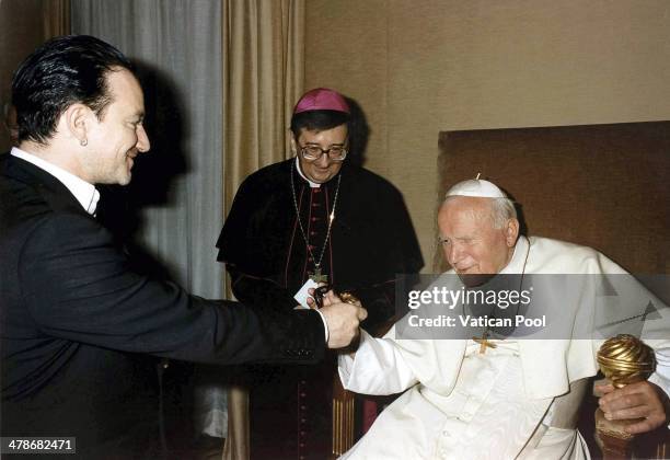 Pope John Paul II receives Bono in the context of the Jubilee 2000 project to cancel 3rd World debt on September 23, 1999 in Castel Gandolfo, Italy.