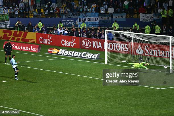 Ever Banega of Argentina takes the third penalty kick in the penalty shootout during the 2015 Copa America Chile quarter final match between...