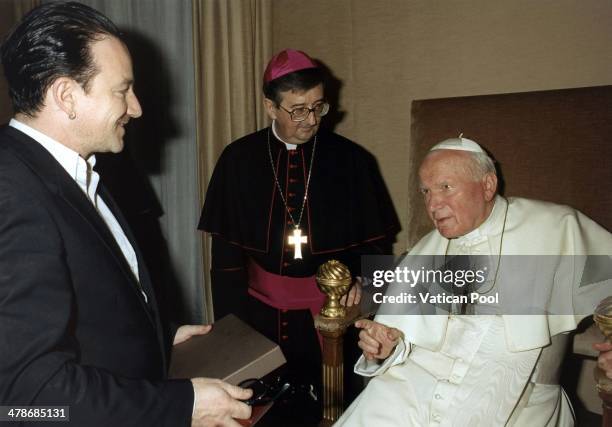 Pope John Paul II receives Bono in the context of the Jubilee 2000 project to cancel 3rd World debt on September 23, 1999 in Castel Gandolfo, Italy.