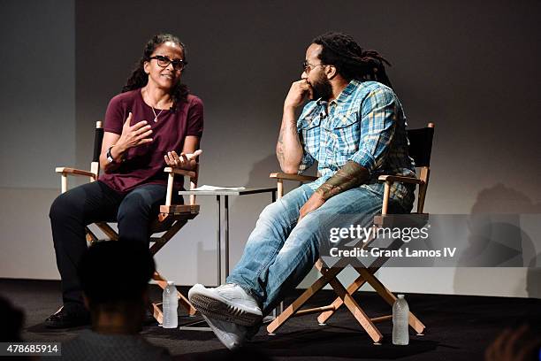 Director of Programming, Reggae & Gospel at Sirius XM, Pat McKay talks with singer Ky-Mani Marley at Apple Store Soho on June 26, 2015 in New York...