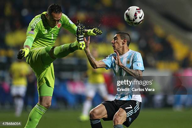 David Ospina of Colombia fights for the ball with Angel di Maria of Argentina during the 2015 Copa America Chile quarter final match between...